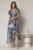 Rochie asimetrica din satin cu imprimeuri bleumarin si decolteu petrecut