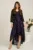Rochie asimetrica neagra in clos din tull cu dublura mov si buline catifelate