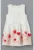 Rochie cu model floral si aplicatie funda pe partea din fata