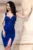 Rochie de ocazie eleganta albastra Ambra scurta cu flori 3D si fronseuri
