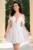 Rochie de ocazie mini ivoire in clos decorata cu flori 3D