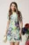 Rochie de zi din stofa verde mint cu flori mov si dantela