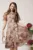 Rochie de zi vaporaosa din voal bej cu imprimeuri florale roz
