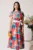Rochie din triplu voal turcoaz cu imprimeu floral orange si cordon in talie