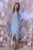 Rochie eleganta bleu midi cu slit si aspet petrecut
