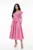 Rochie eleganta cu croi in clos din tafta de culoare roz prevazuta cu flori maxi