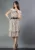 Rochie eleganta din voal usor plisat bej cu buline negre