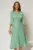 Rochie eleganta verde din voal peliculizat cu decolteu cu decupaj