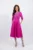 Rochie fucsia tip semicloș cu o fundă prețioasă