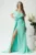 Rochie lunga din voal verde cu umeri goi si floare maxi in talie