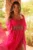 Rochie lunga fucsia din voal in clos cu strasuri si tull in talie