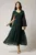 Rochie lunga verde inchis din voal creponat in clos cu maneci despicate