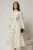 Rochie midi alba cu buline si guler ascutit