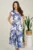 Rochie midi albastra din bumbac in clos cu flori si curea in talie