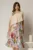 Rochie midi bej de ocazie cu imprimeuri florale pe fusta