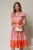 Rochie midi bej din satin in clos cu imprimeuri fucsia oranj si cordon in talie