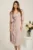 Rochie midi bej din voal in clos cu insertii din fir lurex si floare in talie-Viada