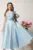 Rochie midi bleu in clos cu bust structurat si aplicatie asimetrica
