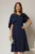 Rochie midi bleumarin cu croi in clini si detaliu floral la bust