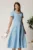 Rochie midi blue din voal in clos cu decolteu petrecut