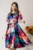 Rochie midi cu imprimeu multicolor din satin in clos cu cordon in talie