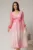 Rochie midi din voal roz cu imprimeuri fucsia si decolteu petrecut