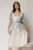 Rochie midi eleganta cu imprimeuri vernil cu fusta clos plisata