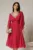 Rochie midi fucsia din tull cu decolteu in V si strassuri aplicate pe linia decolteului