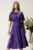 Rochie midi mov din satin in clos cu floare in talie- Moze