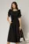 Rochie midi neagra de ocazie cu aplicatie in talie cu margele si maneci decupate