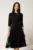 Rochie midi neagra din material reiat in clos cu accesoriu metalic