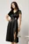 Rochie midi neagra din satin in clos cu accesoriu din strasuri in talie