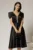 Rochie midi neagra din tafta cu aplicatii la decolteu si pliuri la maneci