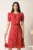 Rochie midi rosie din viscoza in clos cu imprimeuri si curea in talie