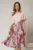 Rochie midi roz de ocazie cu imprimeuri florale pe fusta