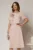 Rochie midi roz de zi cu detaliu amplu floral la bust