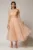 Rochie midi roz somon din organza cu pietre strass si funda ampla pe umar