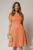 Rochie midi somon din voal cu buline si maneci scurte petrecute