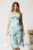 Rochie midi turcoaz din lycra cu croi drept si imprimeu floral