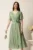 Rochie midi verde deschis din voal clos cu floare in talie- Moze