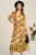 Rochie midi verde lime din viscoza in clos cu imprimeu maro si cordon in talie