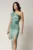 Rochie midi verde mint din satin conica cu fronseu si floare pe talie