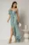 Rochie midi verde mint din voal peliculizat cu croi conic si volanase