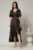 Rochie neagra lunga din satin in clos cu volan si crapatura pe fusta