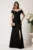 Rochie neagra lunga din stofa cu decolteu barcuta si crapatura pe picior- LaDonna