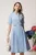 Rochie office din stofa bleu cu croi petrecut si nasturi in talie