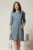 Rochie office din stofa bleu cu floare pe umar
