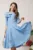 Rochie office din stofa bleu cu volan maxi pe bust