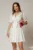 Rochie scurta alba tip sacou cu pliuri pe fusta