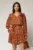 Rochie scurta caramizie cu imprimeu floral si volanas la baza